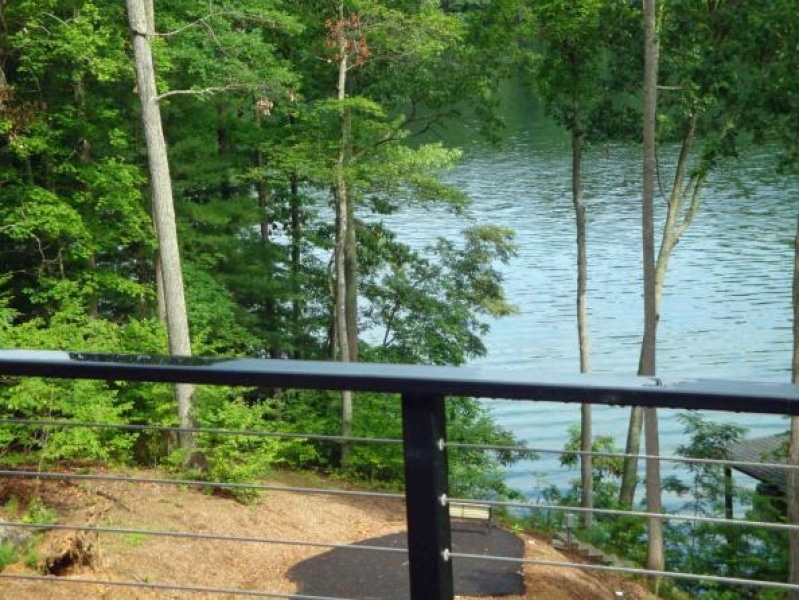 cable and steel railing on porch overlooking lake in Virginia