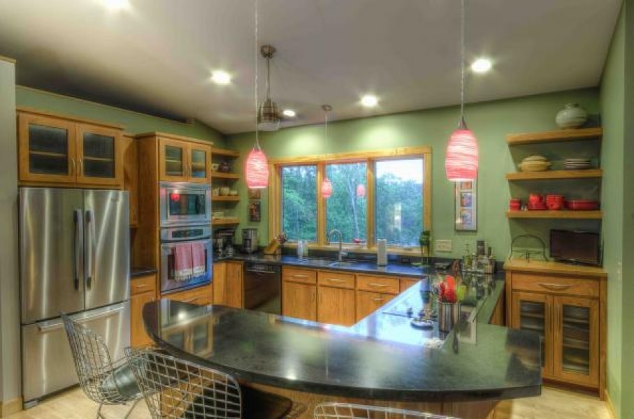 efficient kitchen with custom island in T shape, breakfast bar, for entertaining