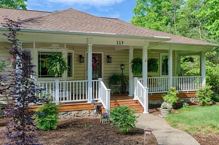 welcoming porch on the front of a house built to order