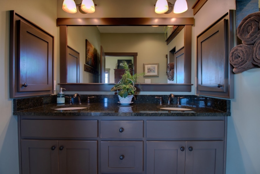 master bath custom vanity cabinets, flanked by matching medicine cabinets
