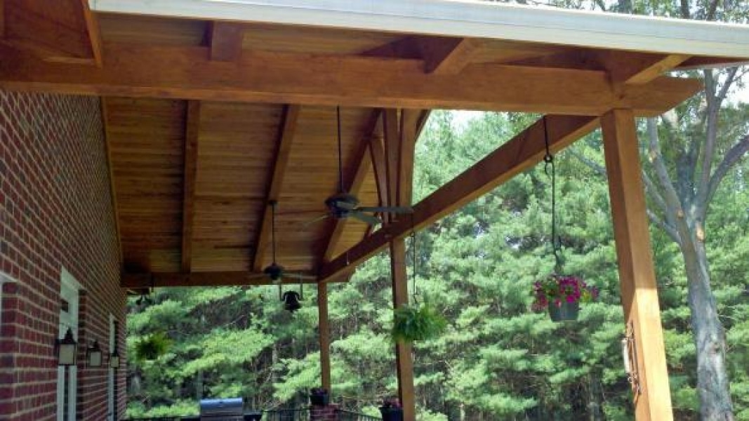 looking up under wood porch roof